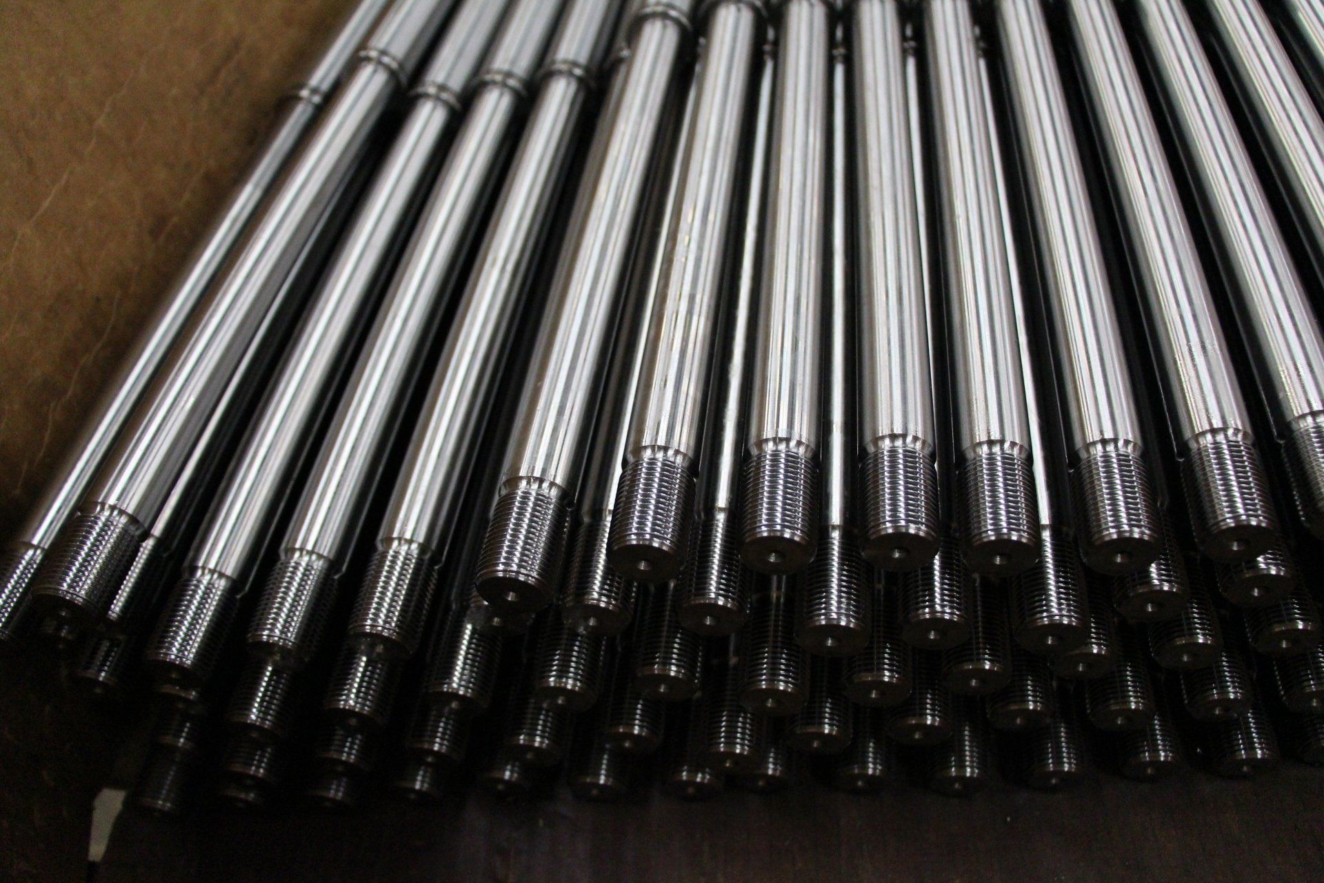 Close-up of finished threaded bars ready for shipping